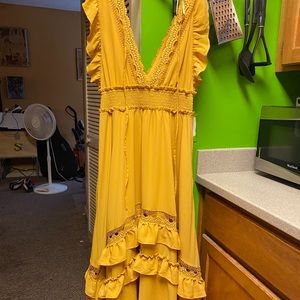 Yellow ruffled flowy dress from Baltic born